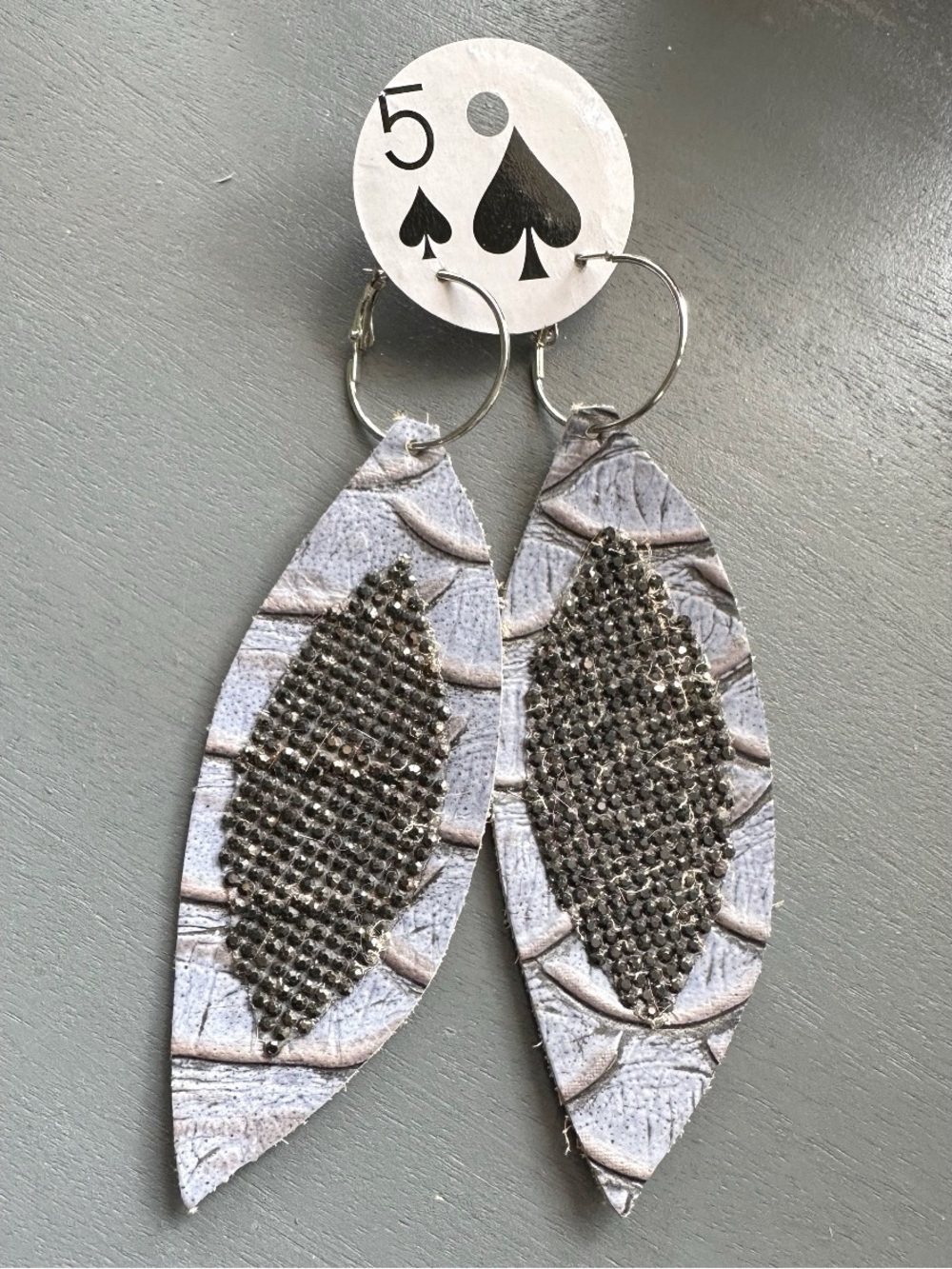 Sandra Ling Gray earrings, pinched leaf design tooled leather